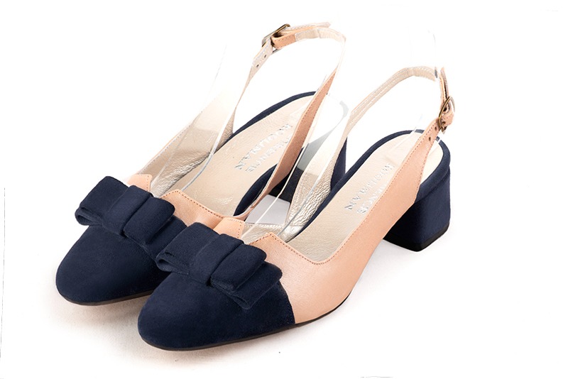 Navy blue and powder pink women's open back shoes, with a knot. Round toe. Low flare heels. Front view - Florence KOOIJMAN